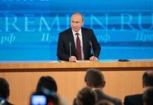 普京:积极评价中国改革开放以来的变化