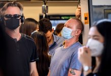 Cities tighten measures against import virus spread