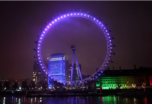 英国地标建筑亮紫灯,悼念纳粹集中营遇难者丨国际热点速递