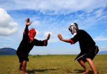 刻木为面,戴着面具跳舞的黎族人丨闲话海南