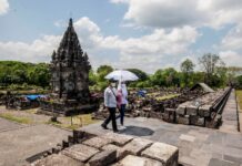 亚洲一些国家新冠疫情趋缓 调整防疫措施