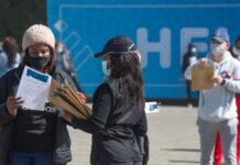 多国实施国际旅行限制防范变异毒株“奥密克戎”扩散