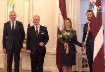 北京冬奥会|拉脱维亚总统为参加北京冬奥会的拉脱维亚代表团举行授旗仪式