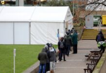 医疗系统不堪负荷 英以调整新冠检测政策